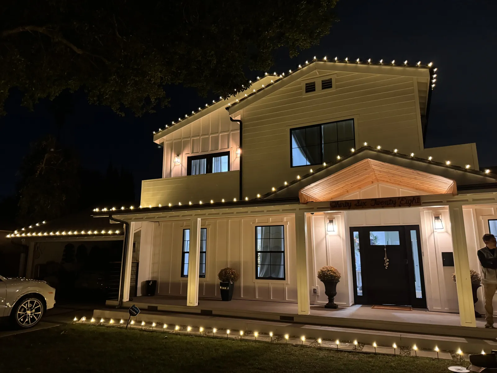 Los Angeles estate with professional Christmas roofline lighting